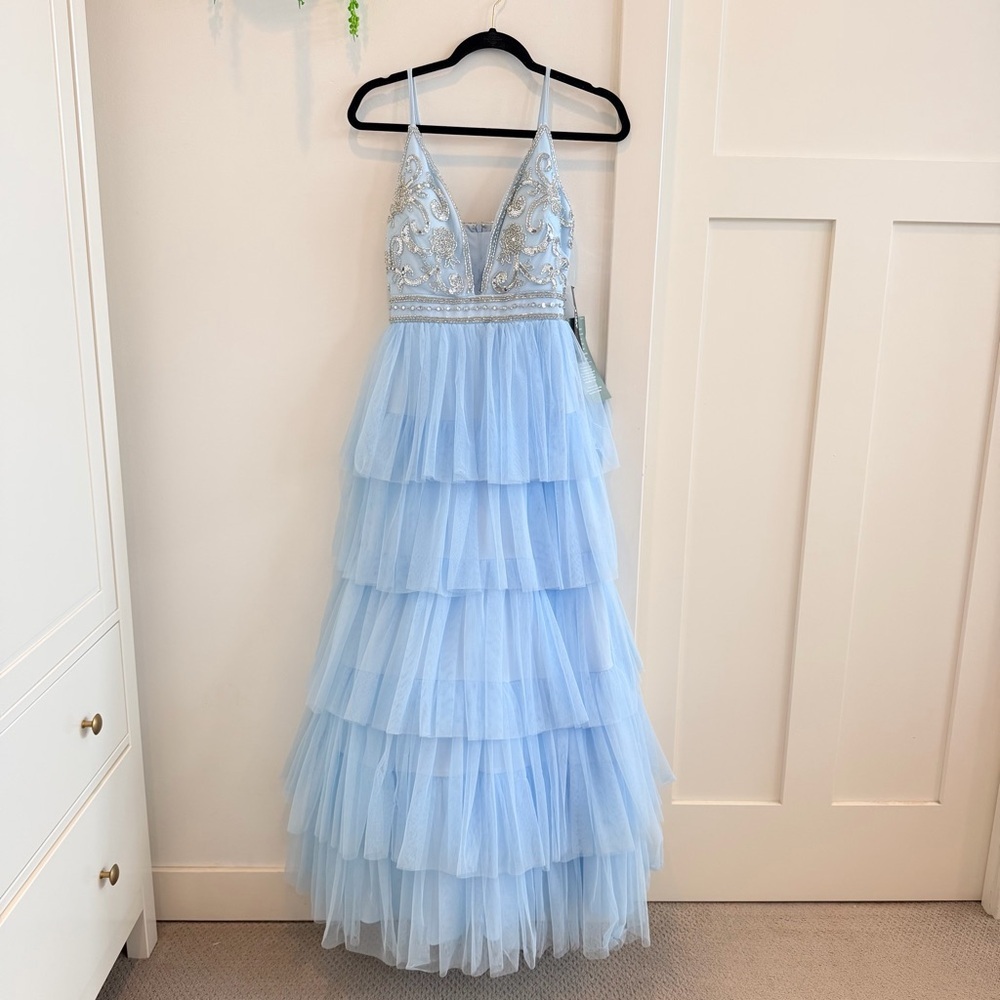 Jump Apparel NWT Beaded V-Neck Bodice Ruffle Tulle Gown Light Blue Size 1/2 New